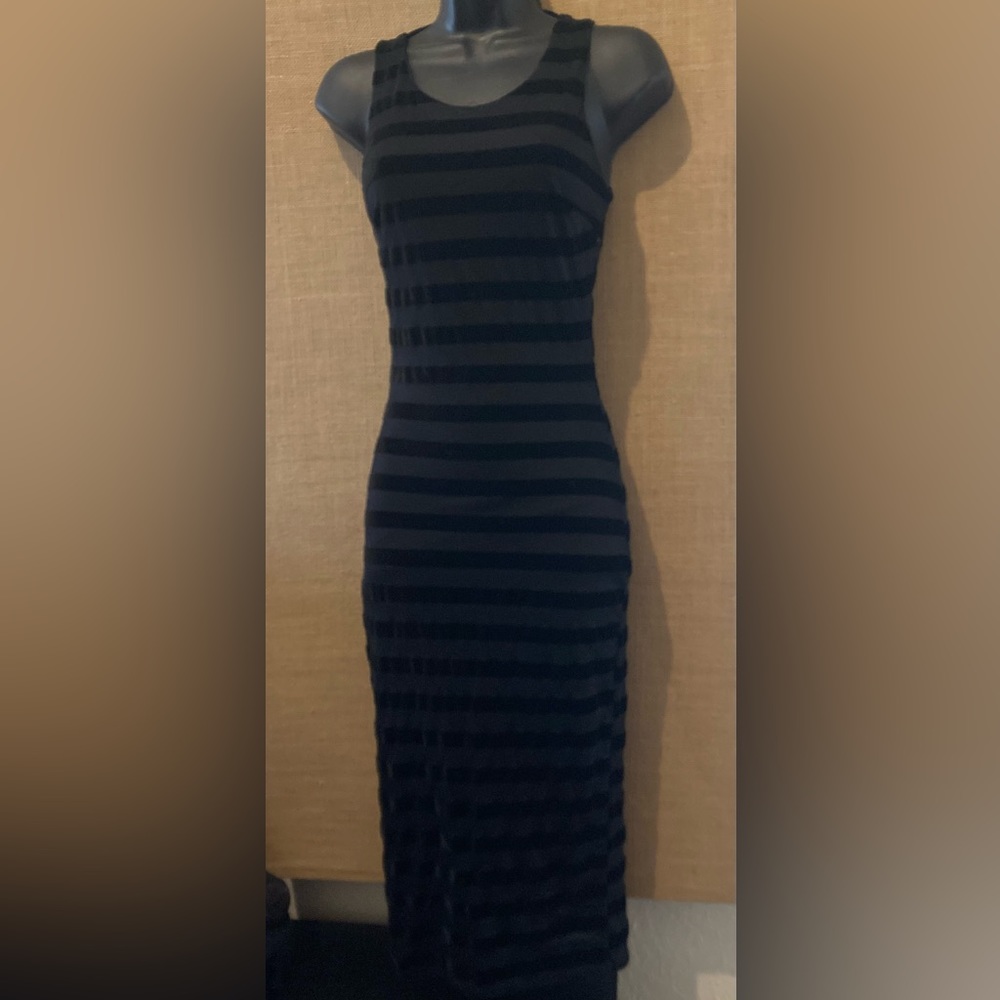 Sexy black midi dress with open back details!